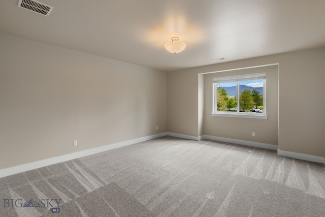 3123 Warbler Way Units A-D, Units A-D Bozeman, MT 59718 - unfurnished room featuring light carpet and baseboards