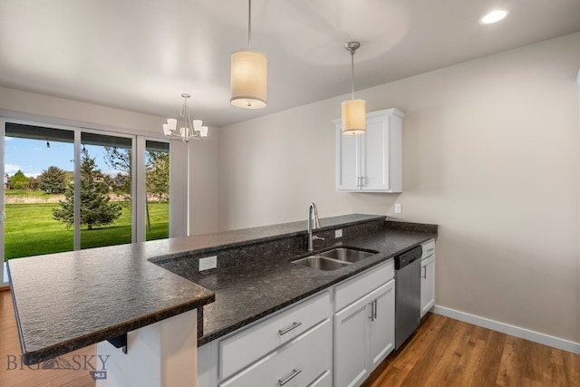 3123 Warbler Way Units A-D, Units A-D Bozeman, MT 59718 - kitchen featuring a sink, dishwasher, a peninsula, baseboards, and white cabinetry