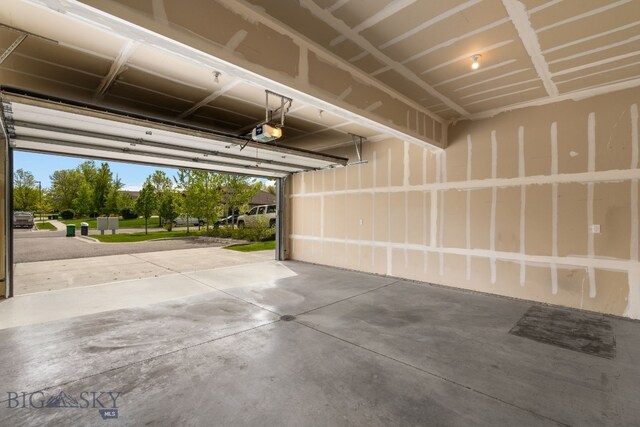 3123 Warbler Way Units A-D, Units A-D Bozeman, MT 59718 - garage with a garage door opener