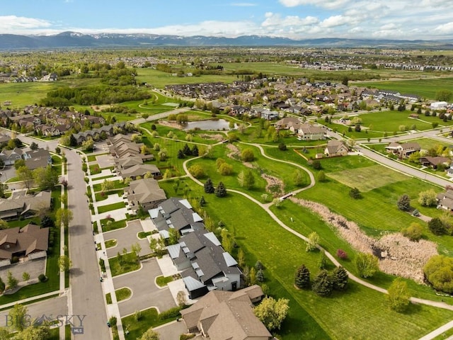 3123 Warbler Way Units A-D, Units A-D Bozeman, MT 59718 - aerial perspective of suburban area featuring a water and mountain view