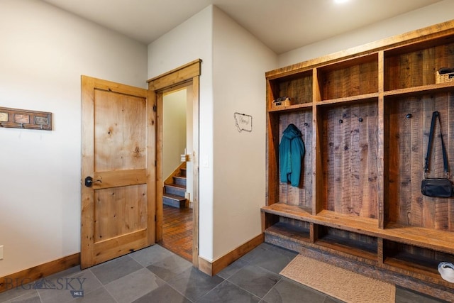 171 Brave Heart Loop, Bozeman, MT 59718 - mudroom with baseboards and dark tile patterned flooring