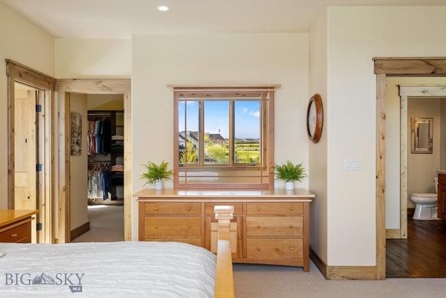 171 Brave Heart Loop, Bozeman, MT 59718 - bedroom featuring light carpet, baseboards, a closet, a spacious closet, and recessed lighting