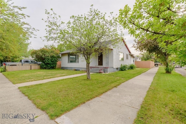 602 1st Ave E, Three Forks, MT 59752 - view of front of property with stucco siding