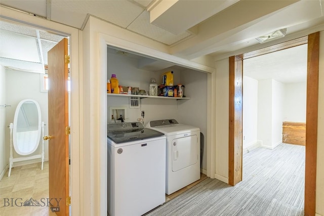 602 1st Ave E, Three Forks, MT 59752 - laundry area with separate washer and dryer and baseboards