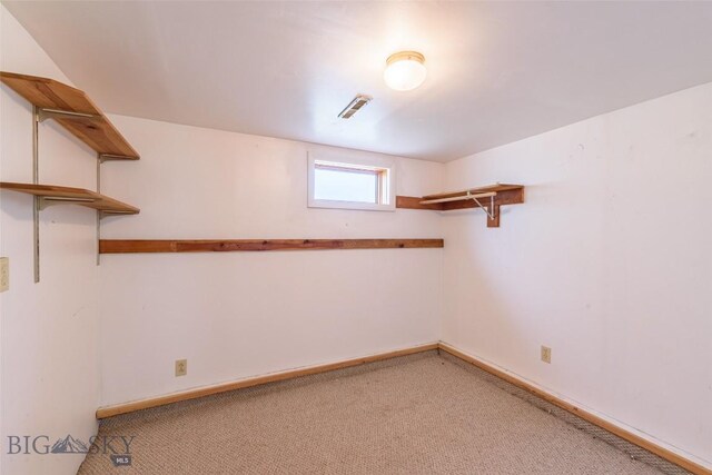 602 1st Ave E, Three Forks, MT 59752 - below grade area with light colored carpet and baseboards