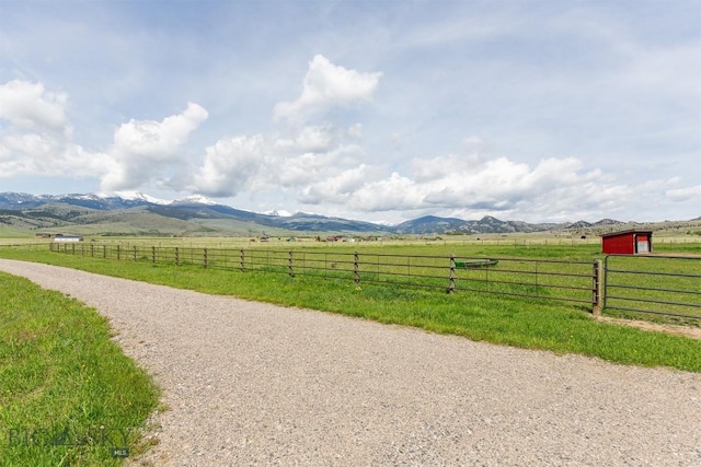 49 Redtail Hawk Rd, Mcallister, MT 59740 - view of dirt / gravel road with a view of countryside and a mountain view