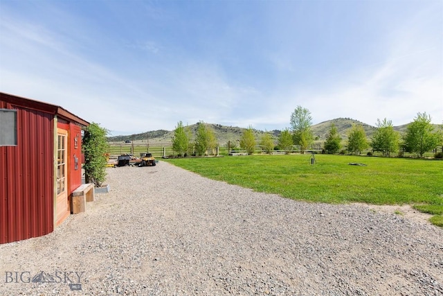 49 Redtail Hawk Rd, Mcallister, MT 59740 - view of dirt / gravel driveway featuring a mountain view and a rural view