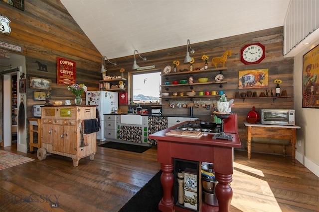 49 Redtail Hawk Rd, Mcallister, MT 59740 - recreation room with dark wood-type flooring, vaulted ceiling, and wooden walls