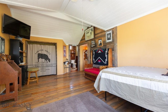 49 Redtail Hawk Rd, Mcallister, MT 59740 - bedroom with wood finished floors, vaulted ceiling, and wood walls
