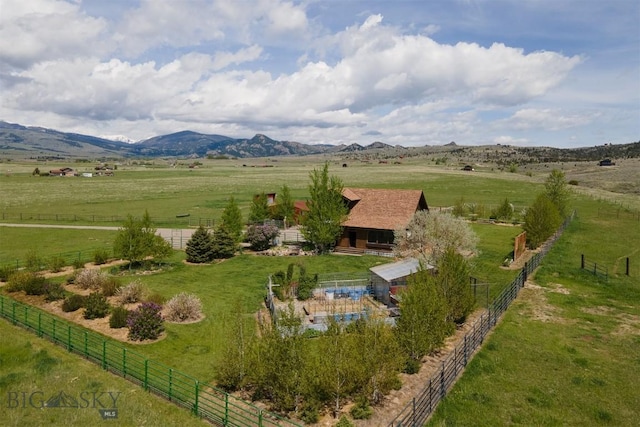 49 Redtail Hawk Rd, Mcallister, MT 59740 - aerial view of sparsely populated area with a pastoral area and a mountain backdrop