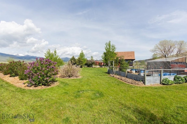 49 Redtail Hawk Rd, Mcallister, MT 59740 - view of grassy yard featuring a mountain view