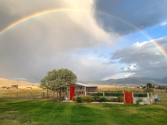 49 Redtail Hawk Rd, Mcallister, MT 59740 - view of yard with a mountain view, a rural view, and a garden