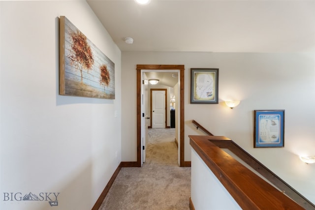 4426 Ethan Way, Bozeman, MT 59718 - hall featuring an upstairs landing, light carpet, and baseboards