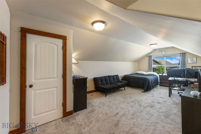 4426 Ethan Way, Bozeman, MT 59718 - carpeted bedroom featuring vaulted ceiling