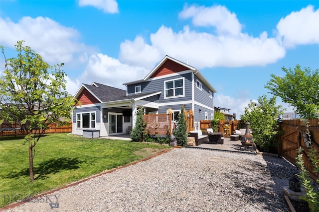 4426 Ethan Way, Bozeman, MT 59718 - rear view of house featuring a patio area and an outdoor living space