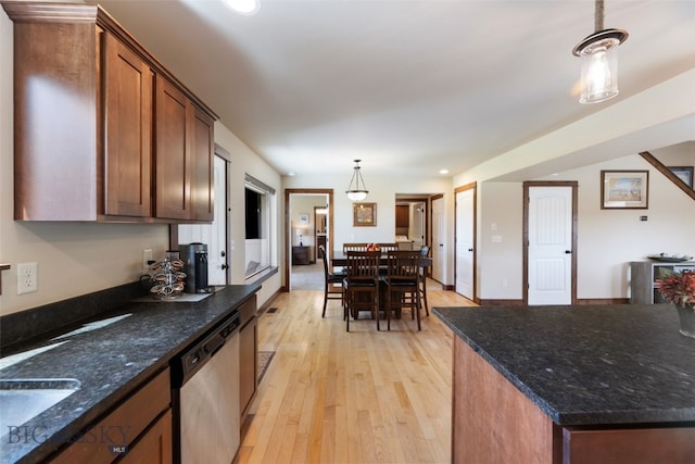 4426 Ethan Way, Bozeman, MT 59718 - kitchen featuring dishwasher, light wood finished floors, pendant lighting, recessed lighting, and dark stone counters