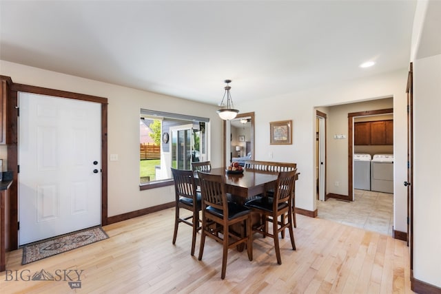 4426 Ethan Way, Bozeman, MT 59718 - dining space with washing machine and clothes dryer, baseboards, light wood-style flooring, and recessed lighting