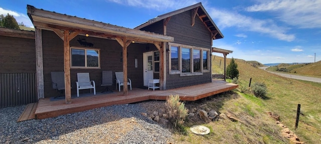 747 Upper Ruby Rd, Alder, MT 59755 - back of property featuring a deck and metal roof