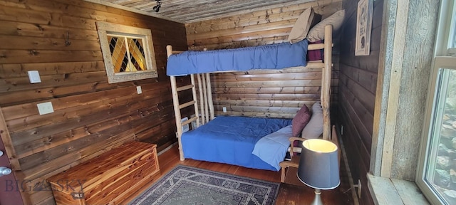 747 Upper Ruby Rd, Alder, MT 59755 - bedroom with wood walls, wood finished floors, and wood ceiling