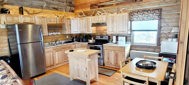 747 Upper Ruby Rd, Alder, MT 59755 - kitchen with appliances with stainless steel finishes, light brown cabinets, a sink, light wood-style floors, and wooden counters