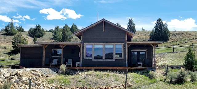 747 Upper Ruby Rd, Alder, MT 59755 - rear view of house featuring french doors