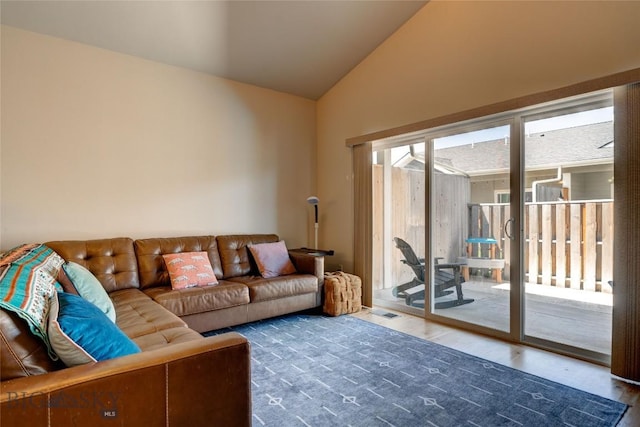 20 Voyager Ln Unit B, Bozeman, MT 59718 - living area featuring wood finished floors and high vaulted ceiling