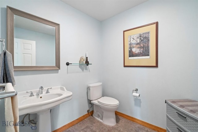 125 N Pheasant Dr, Bozeman, MT 59718 - bathroom with baseboards and toilet