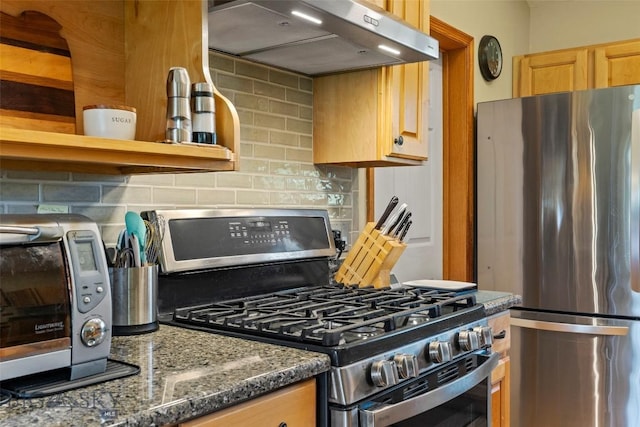 125 N Pheasant Dr, Bozeman, MT 59718 - kitchen with stainless steel appliances, exhaust hood, backsplash, open shelves, and dark stone countertops