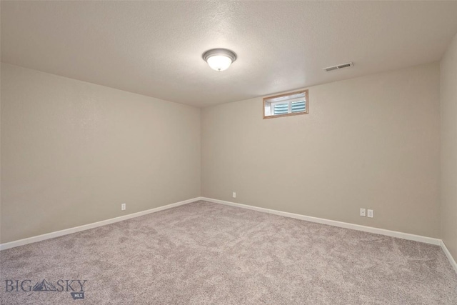 125 N Pheasant Dr, Bozeman, MT 59718 - unfurnished room featuring carpet flooring, baseboards, and a textured ceiling