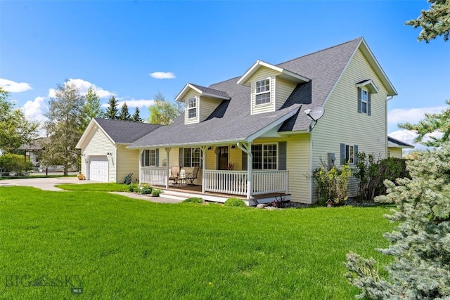 125 N Pheasant Dr, Bozeman, MT 59718 - cape cod-style house featuring covered porch, a garage, a front yard, and driveway