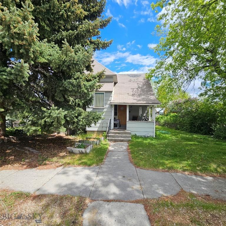 214 N Cedar St, Townsend, MT 59644 - view of front of property featuring a front lawn and roof with shingles