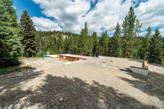 715 Colters Run Loop Lot 25, Gallatin Gateway, MT 59730 - view of home's community featuring a forest view
