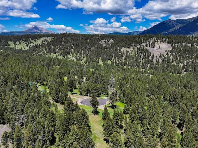 715 Colters Run Loop Lot 25, Gallatin Gateway, MT 59730 - drone / aerial view of a heavily wooded area and mountains