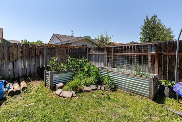 577 W Shore Dr, Belgrade, MT 59714 - view of yard featuring a vegetable garden