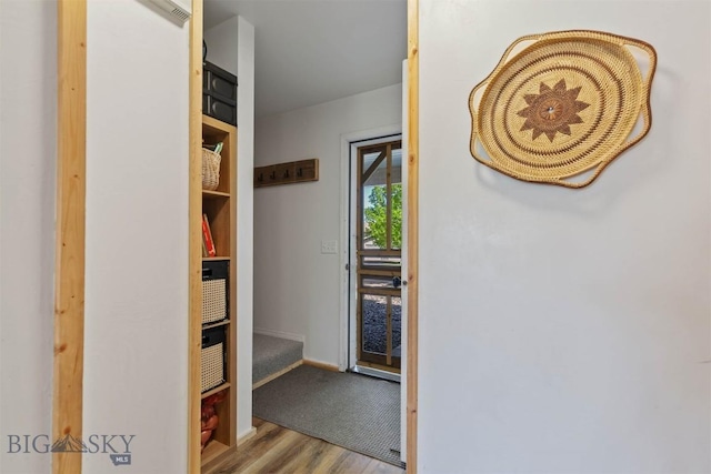 577 W Shore Dr, Belgrade, MT 59714 - hall featuring wood finished floors and baseboards