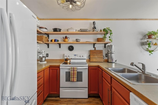 577 W Shore Dr, Belgrade, MT 59714 - kitchen featuring white appliances, a sink, light countertops, dark wood-style floors, and open shelves
