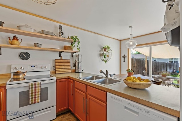 577 W Shore Dr, Belgrade, MT 59714 - kitchen with white appliances, a sink, open shelves, light countertops, and decorative light fixtures