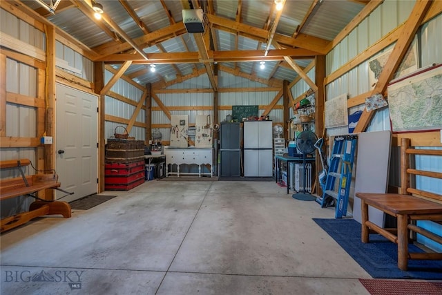 207 2nd St E, Clyde Park, MT 59018 - garage featuring a garage door opener