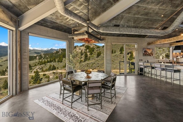 405 Swayback Rd, Mcallister, MT 59740 - sunroom featuring healthy amount of natural light and a mountain view