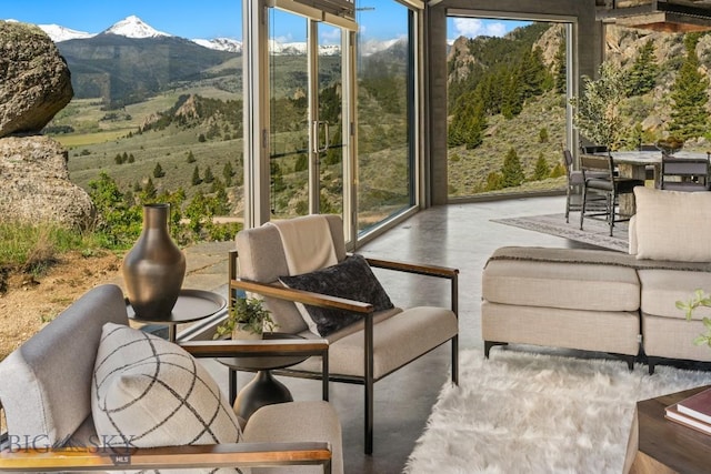 405 Swayback Rd, Mcallister, MT 59740 - sunroom featuring a mountain view