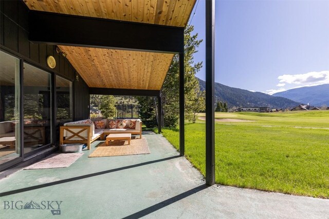 1930 Yellowtail, Big Sky, MT 59716 - view of patio with a mountain view and an outdoor hangout area