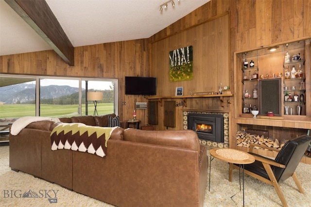1930 Yellowtail, Big Sky, MT 59716 - living area with wooden walls and a glass covered fireplace