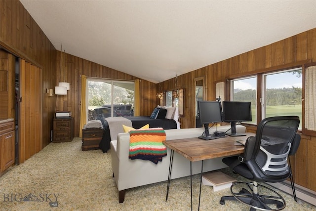 1930 Yellowtail, Big Sky, MT 59716 - home office with wooden walls, vaulted ceiling, and light carpet