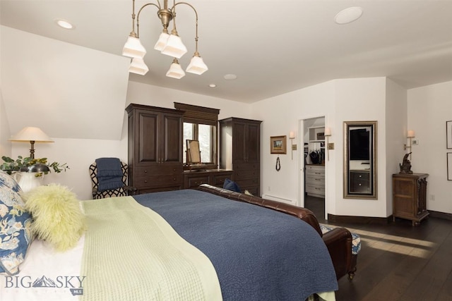 45 Cutthroat Trout, Big Sky, MT 59716 - bedroom featuring dark wood-style floors, a spacious closet, and baseboards