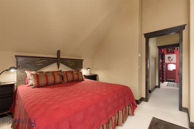 45 Cutthroat Trout, Big Sky, MT 59716 - carpeted bedroom featuring vaulted ceiling and baseboards