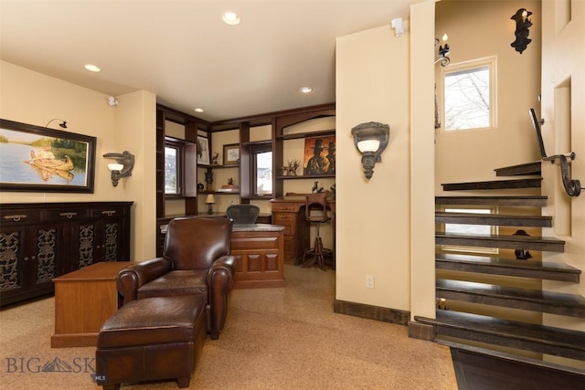 45 Cutthroat Trout, Big Sky, MT 59716 - carpeted living room featuring recessed lighting and stairway