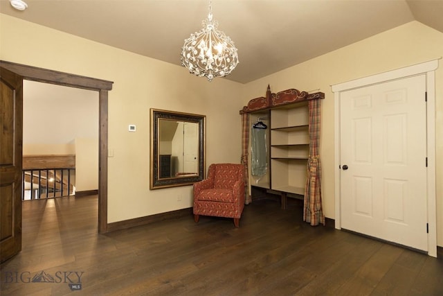45 Cutthroat Trout, Big Sky, MT 59716 - living area featuring a chandelier, dark wood finished floors, baseboards, and lofted ceiling