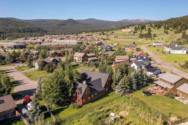 45 Cutthroat Trout, Big Sky, MT 59716 - aerial view of property's location featuring a mountainous background and nearby suburban area
