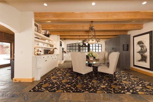 45 Cutthroat Trout, Big Sky, MT 59716 - dining room with arched walkways, recessed lighting, baseboards, beam ceiling, and a chandelier