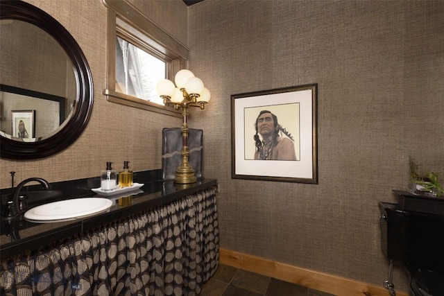 45 Cutthroat Trout, Big Sky, MT 59716 - bathroom featuring a sink and baseboards